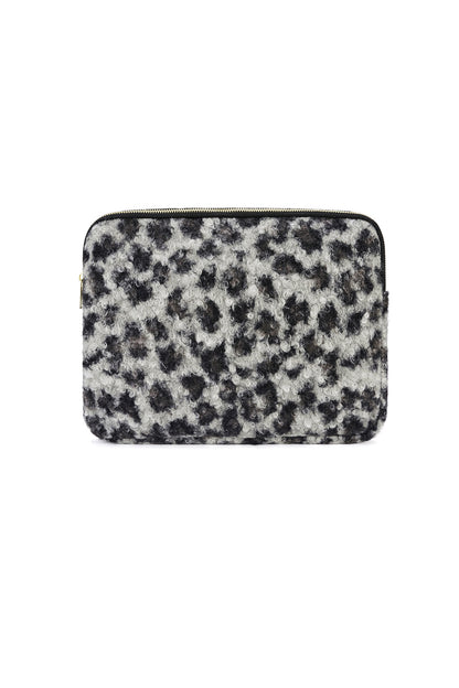 Front view of leopard print plush laptop sleeve with gold zipper on white background