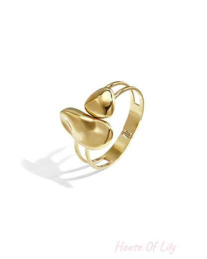 Cuff statement bracelet with organic shapes