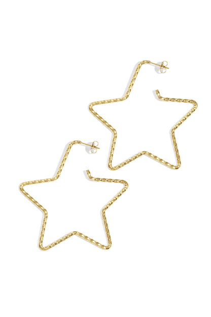 Pair of gold-tone textured star-shaped hoop earrings on white background
