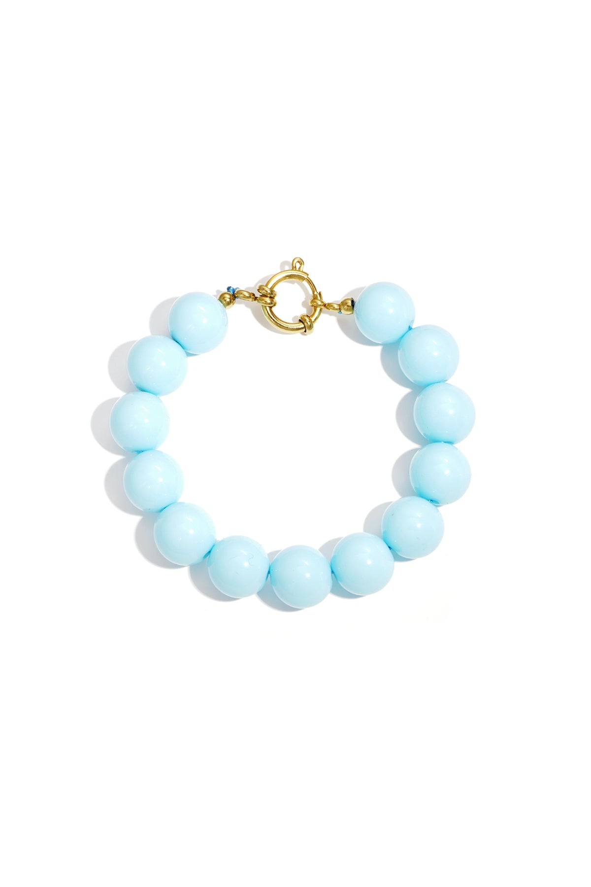 Light blue chunky beaded bracelet with smooth resin beads and gold clasp