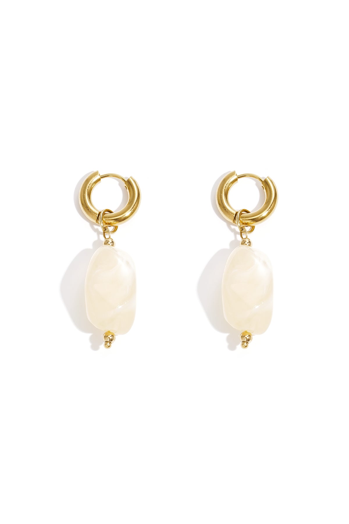 Gold hoop earrings with irregular mint green resin drop beads on white background