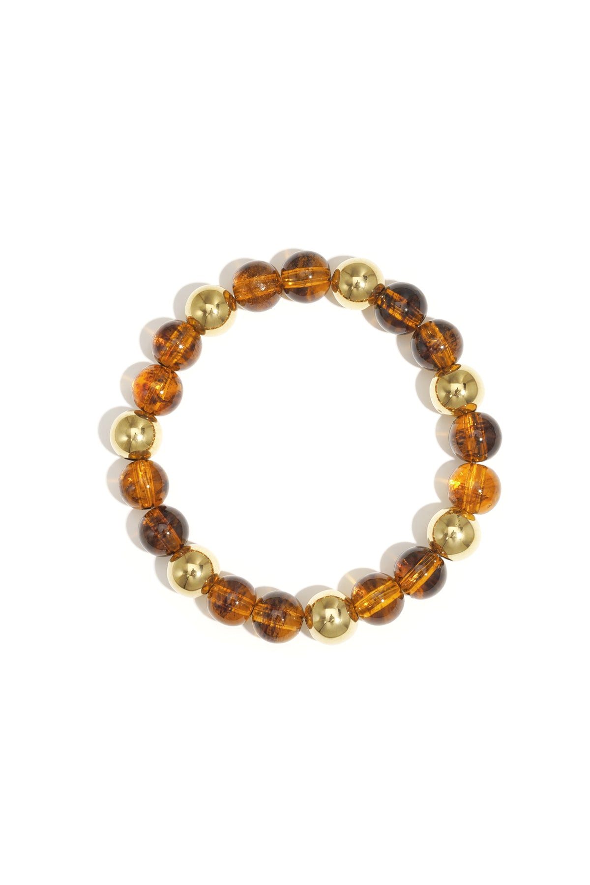 Single acrylic beaded bracelet featuring alternating transparent amber brown and gold-tone beads isolated on white background