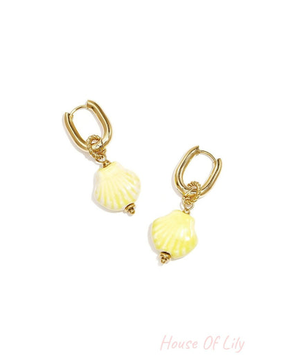 Squoval earrings with dangling shell