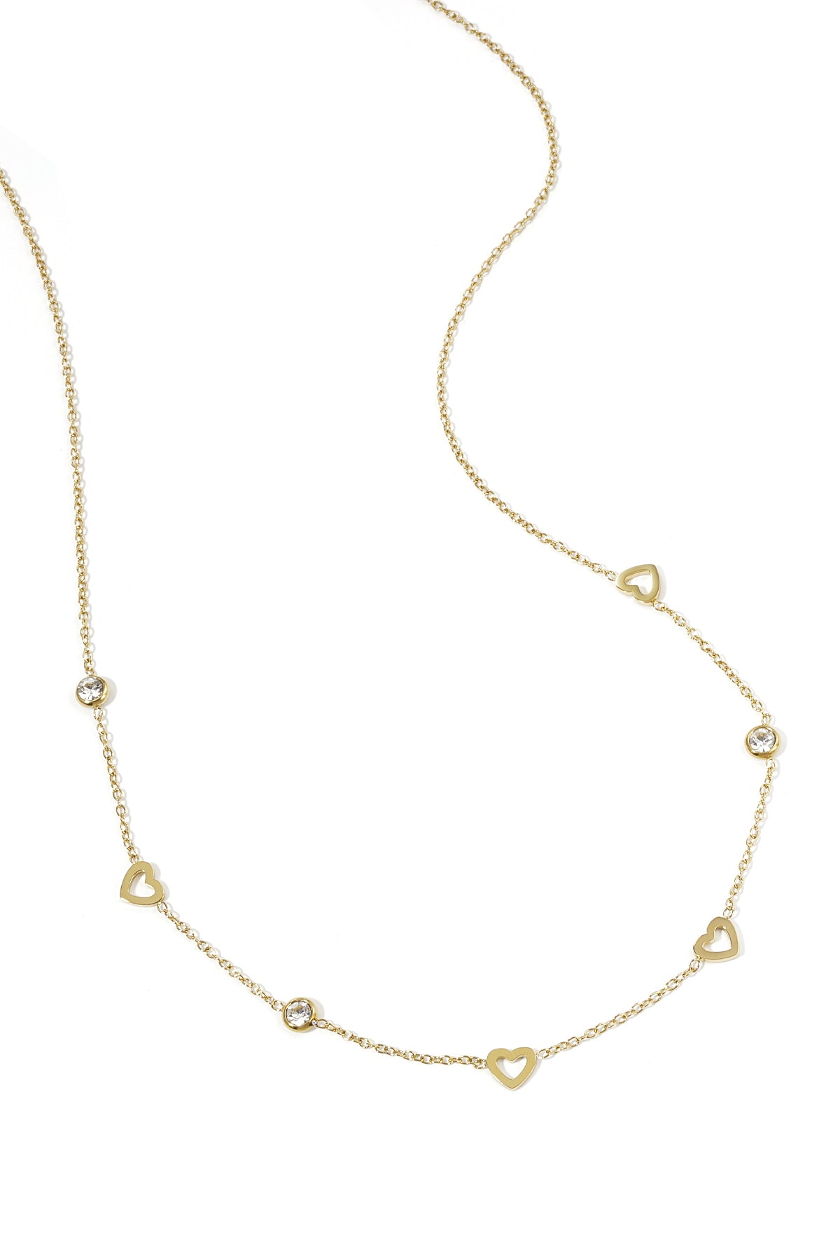 Gold toned delicate chain necklace with small open heart charms and clear rhinestones spaced evenly on a white background