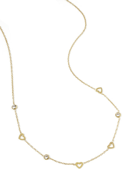 Gold toned delicate chain necklace with small open heart charms and clear rhinestones spaced evenly on a white background
