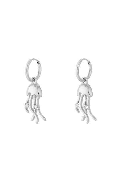 Pair of silver jellyfish drop earrings with rhinestone accents on white background