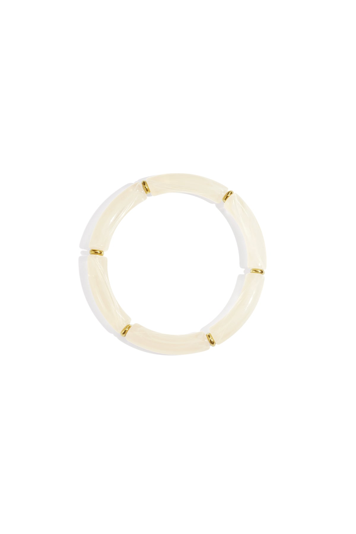 Cream ivory resin tube bracelet with gold-tone ring spacers on white background