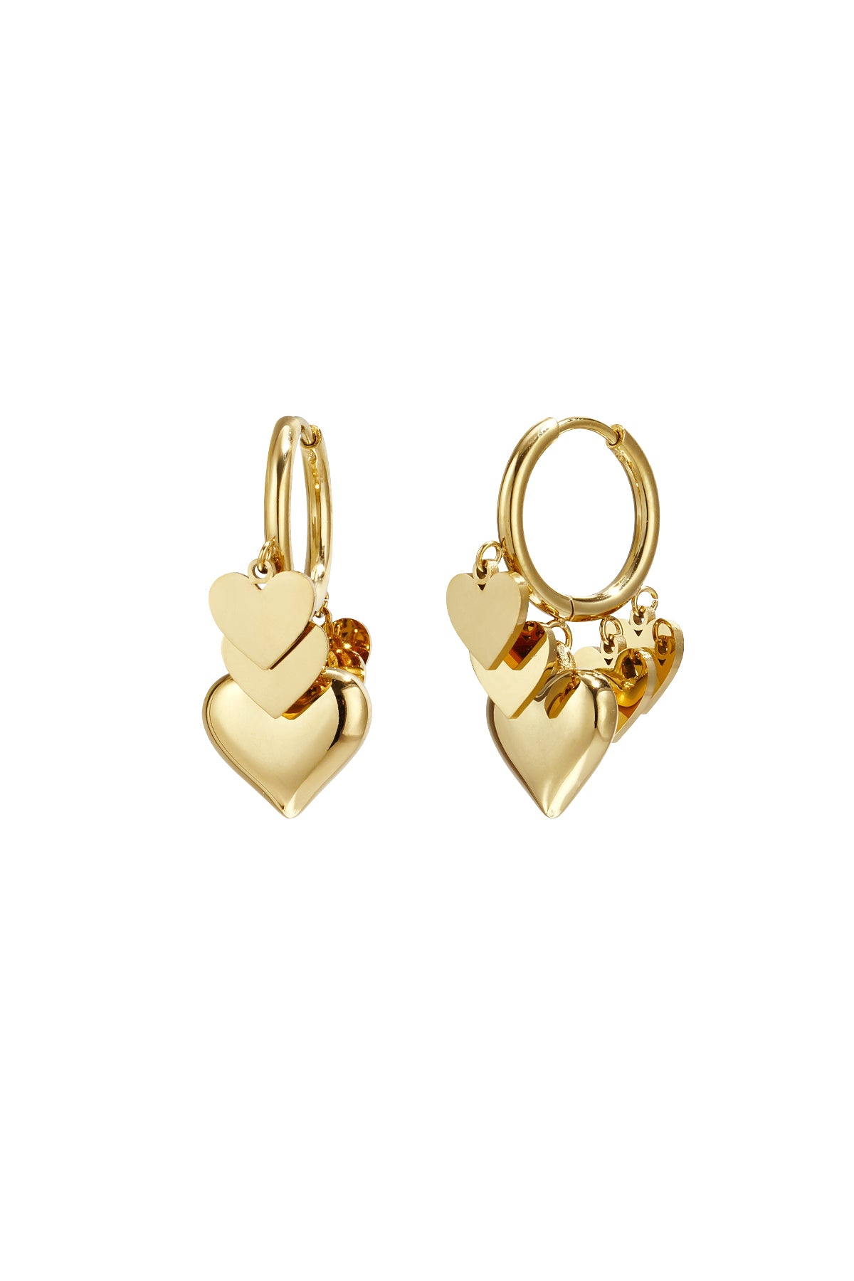 Pair of gold drop earrings with three layered heart charms hanging from hoops on white background