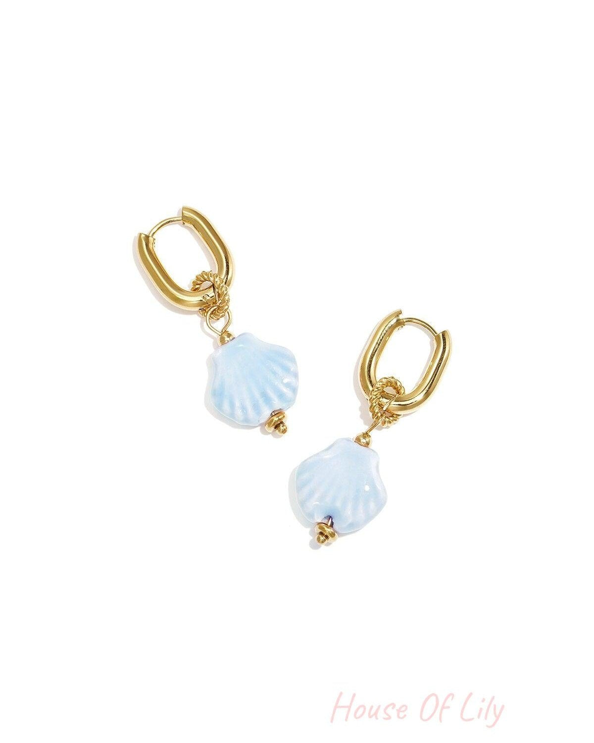 Squoval earrings with dangling shell