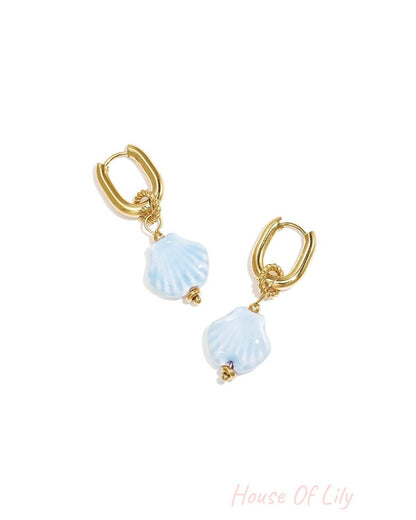 Squoval earrings with dangling shell