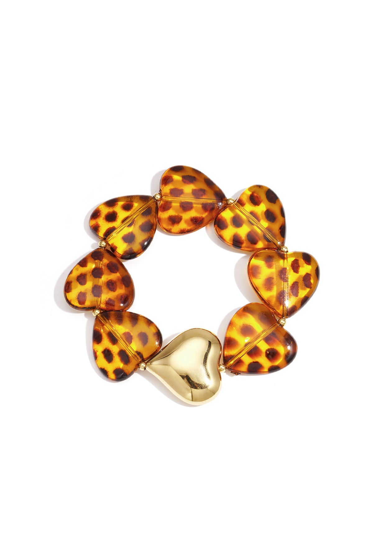 Heart-shaped leopard print acrylic bead bracelet with gold-tone heart accent on white background
