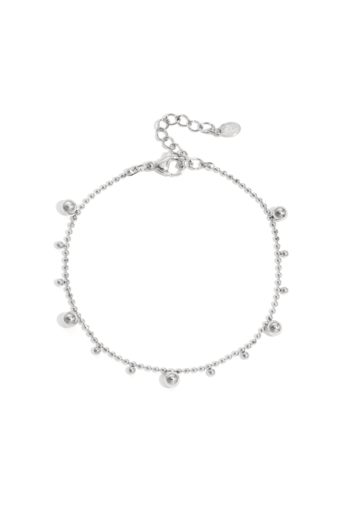 Silver-toned delicate beaded chain bracelet with alternating small and medium shiny balls and adjustable lobster clasp