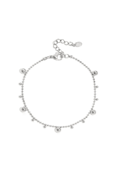 Silver-toned delicate beaded chain bracelet with alternating small and medium shiny balls and adjustable lobster clasp