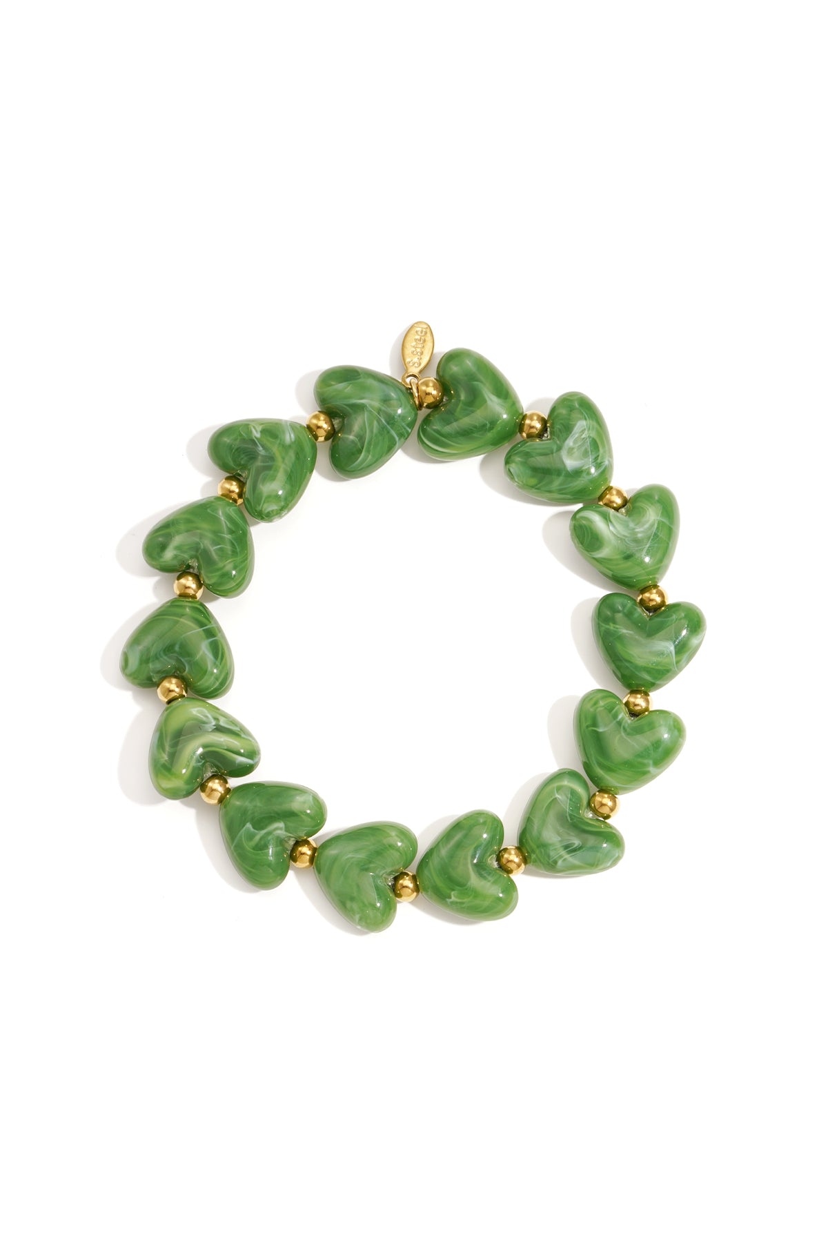Green marbled heart beaded stretch bracelet with gold accent beads on white background