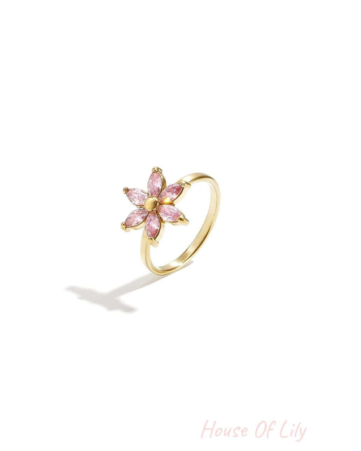 Ring with rhinestone flower