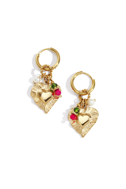 Pair of gold-tone heart charm drop earrings with pink and green beads and small pearls displayed on white background