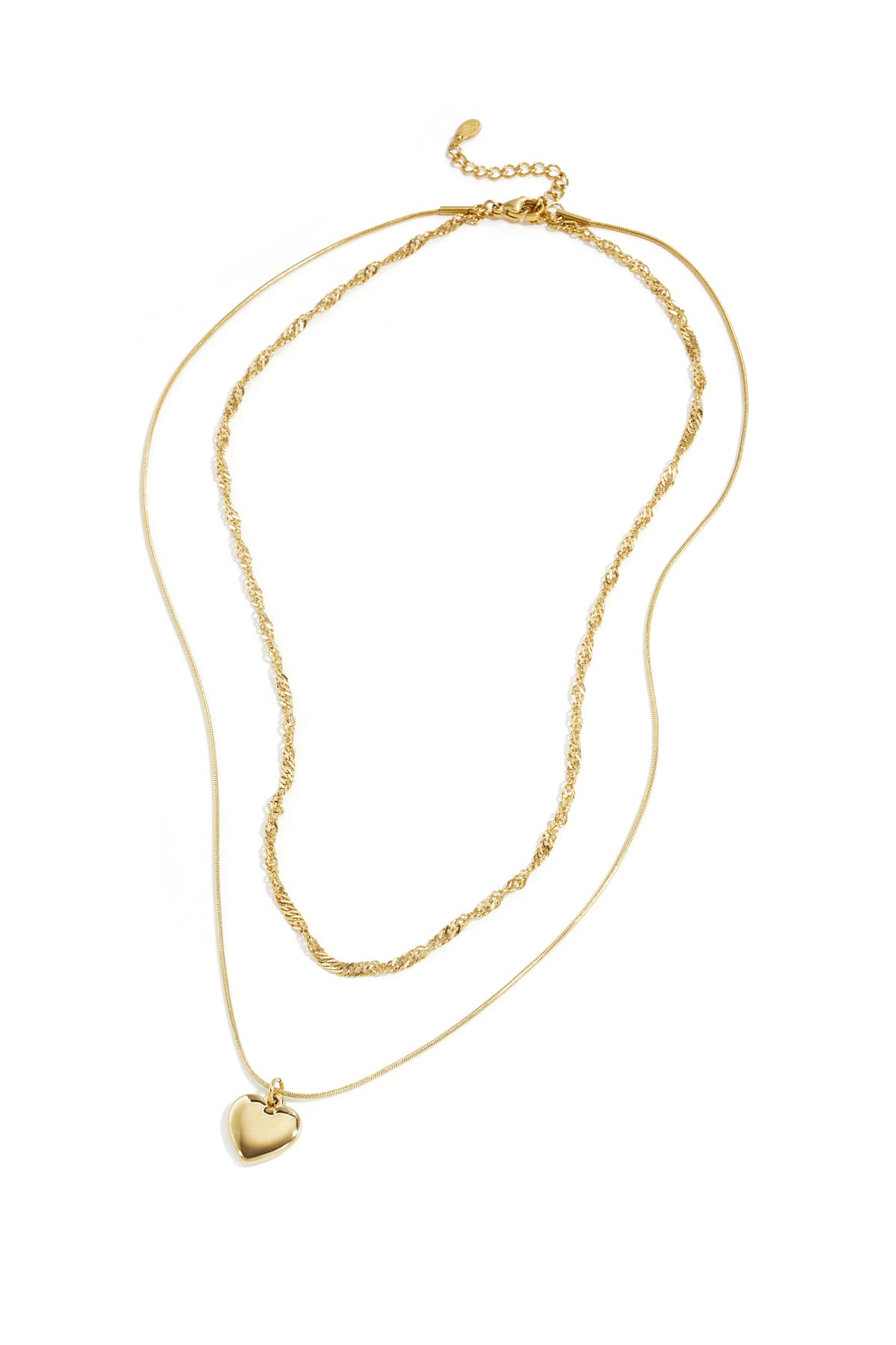 Gold two-layer necklace with twisted chain and heart-shaped pendant laid on white background