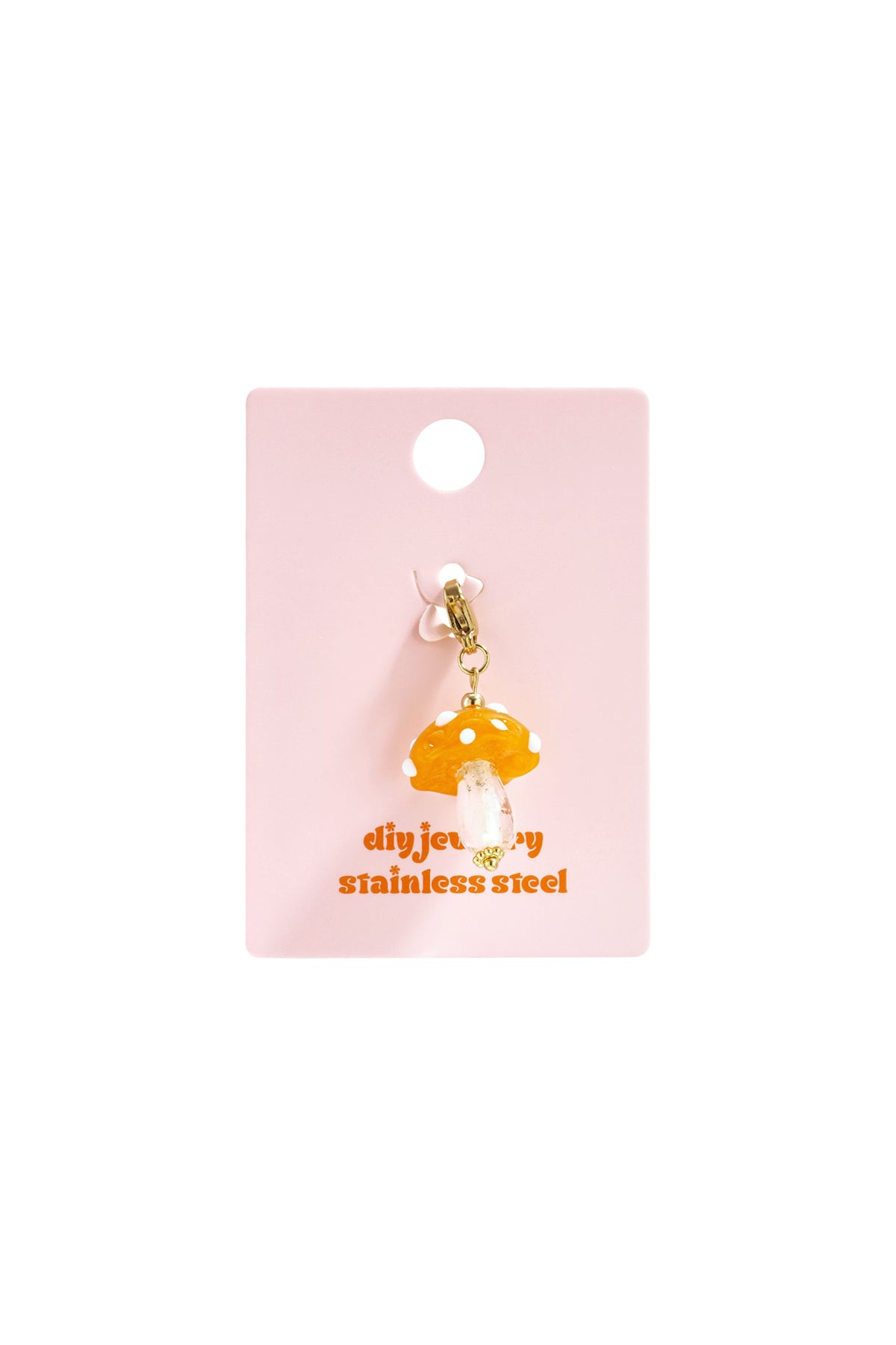 Orange mushroom charm with a translucent orange cap, white dots, and clear stem, attached to a gold lobster clasp.