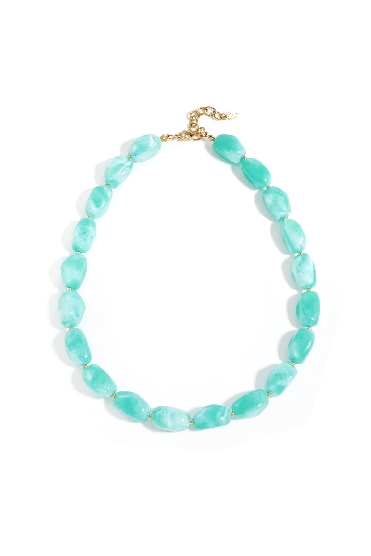 Turquoise chunky acrylic beaded necklace with gold spacer beads on white background