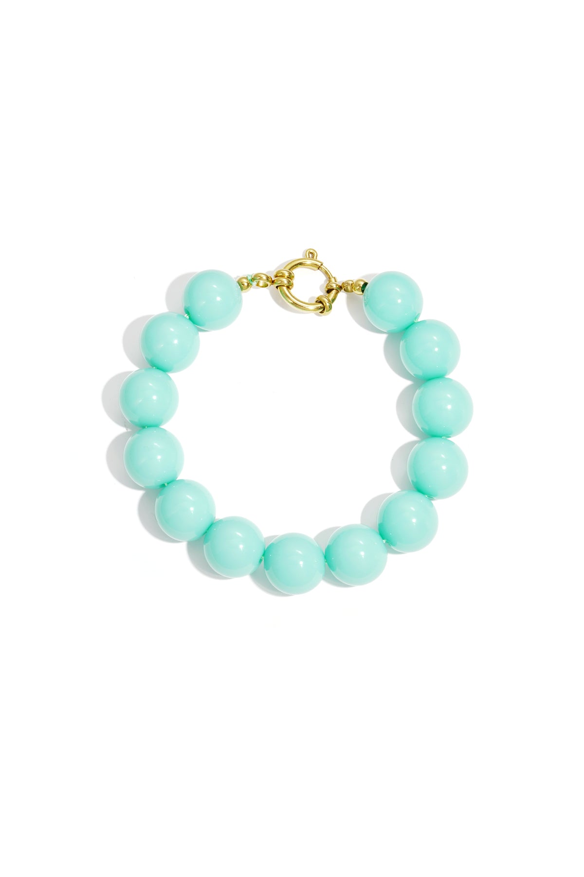 Mint green chunky beaded bracelet showcasing glossy resin beads and gold clasp