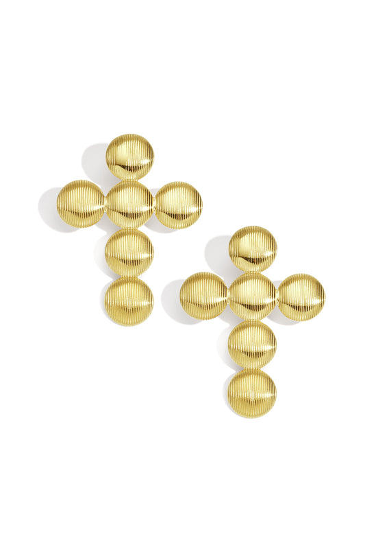 Pair of textured gold cross-shaped stud earrings with ribbed discs arranged in a cross pattern on white background