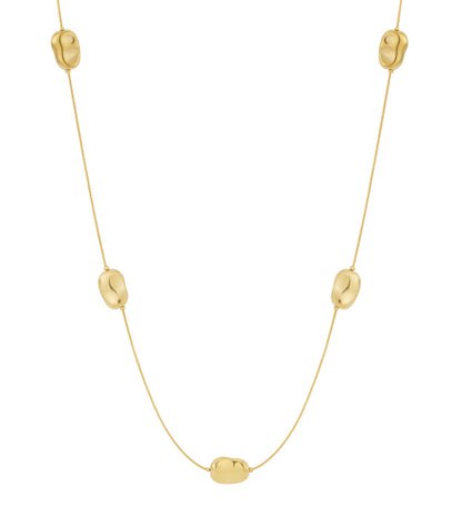 Minimalist long gold necklace with five polished bean-shaped beads evenly spaced on delicate chain