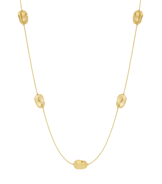 Minimalist long gold necklace with five polished bean-shaped beads evenly spaced on delicate chain