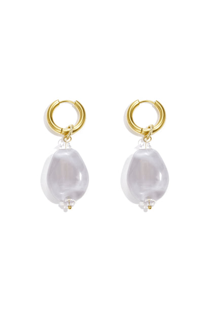 Pair of gold hoop earrings with clear white cloudy resin beads