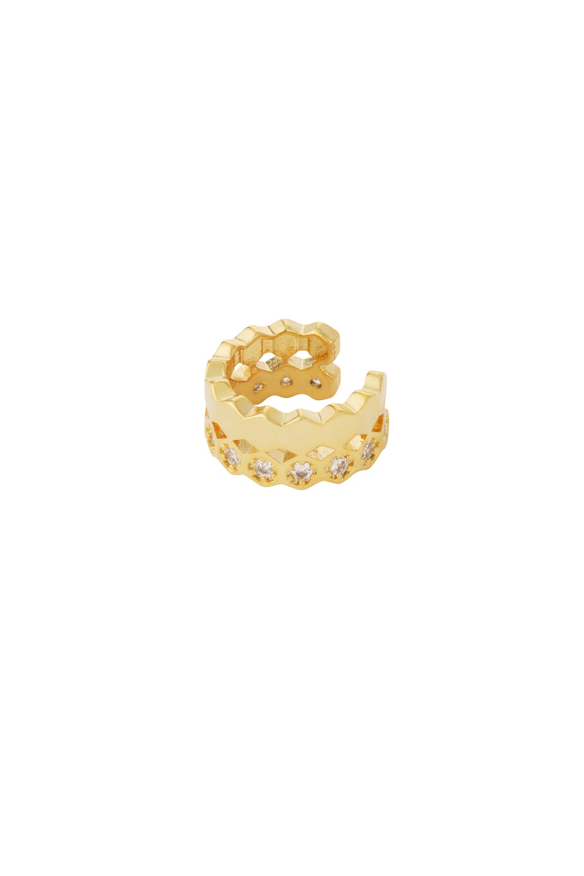 Close-up of a shiny gold geometric ear cuff with zigzag design and embedded crystals