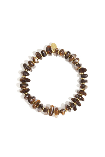Earthy brown chunky beaded stretch bracelet featuring irregular beads separated by gold spacers