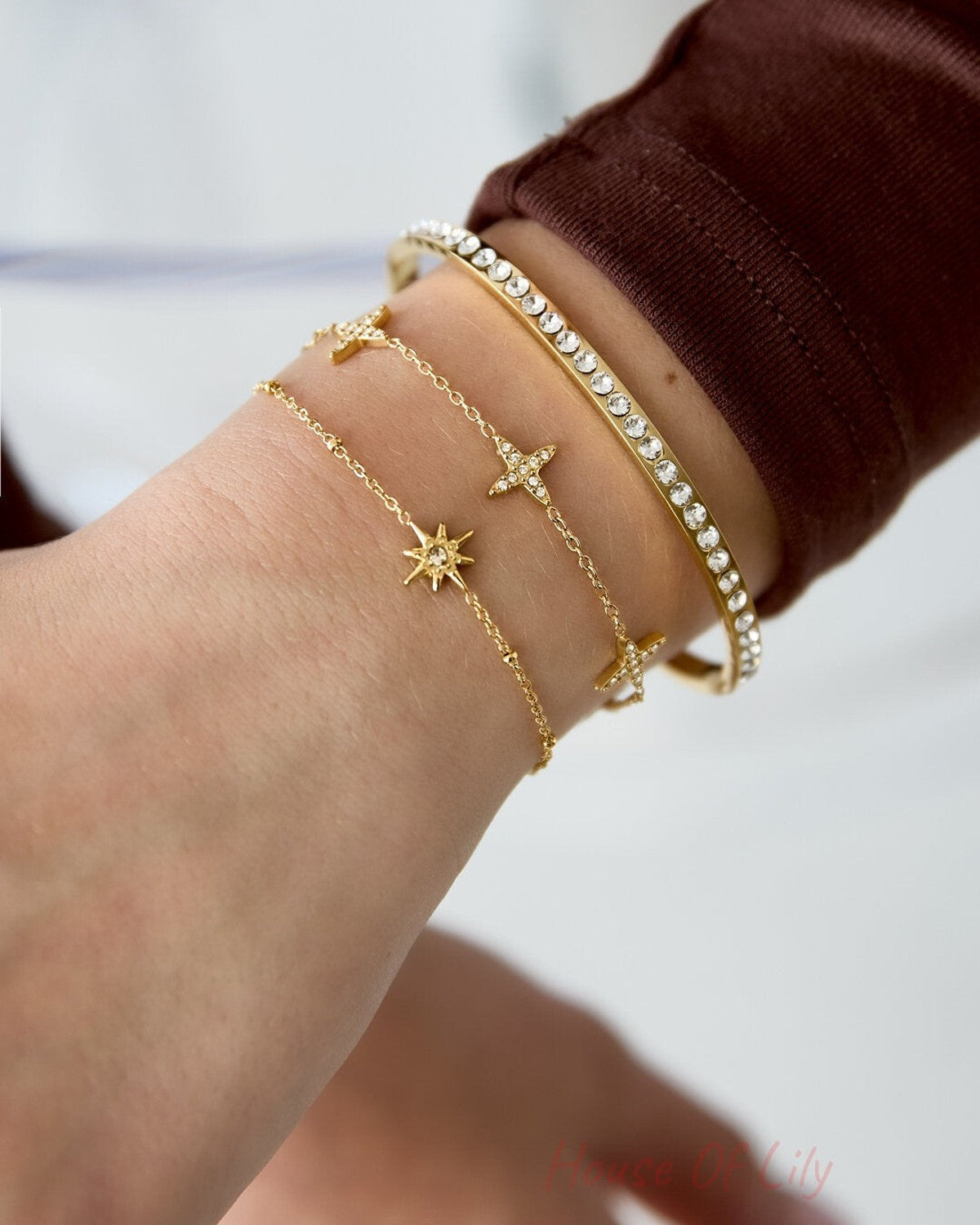 Bracelet with clover motif and inlaid clovers
