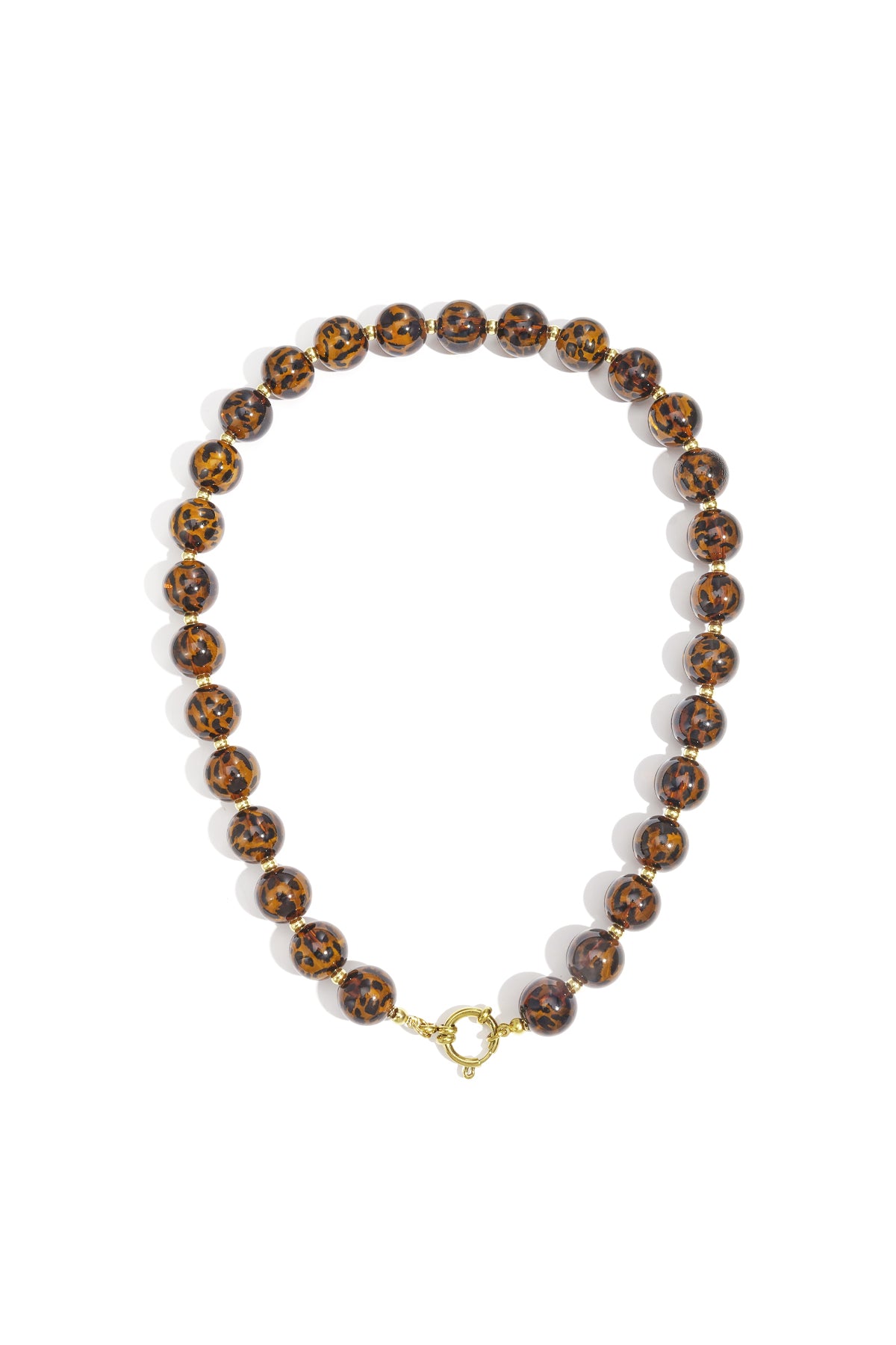 Close-up of a leopard print beaded necklace with small gold spacer beads and gold clasp on white background