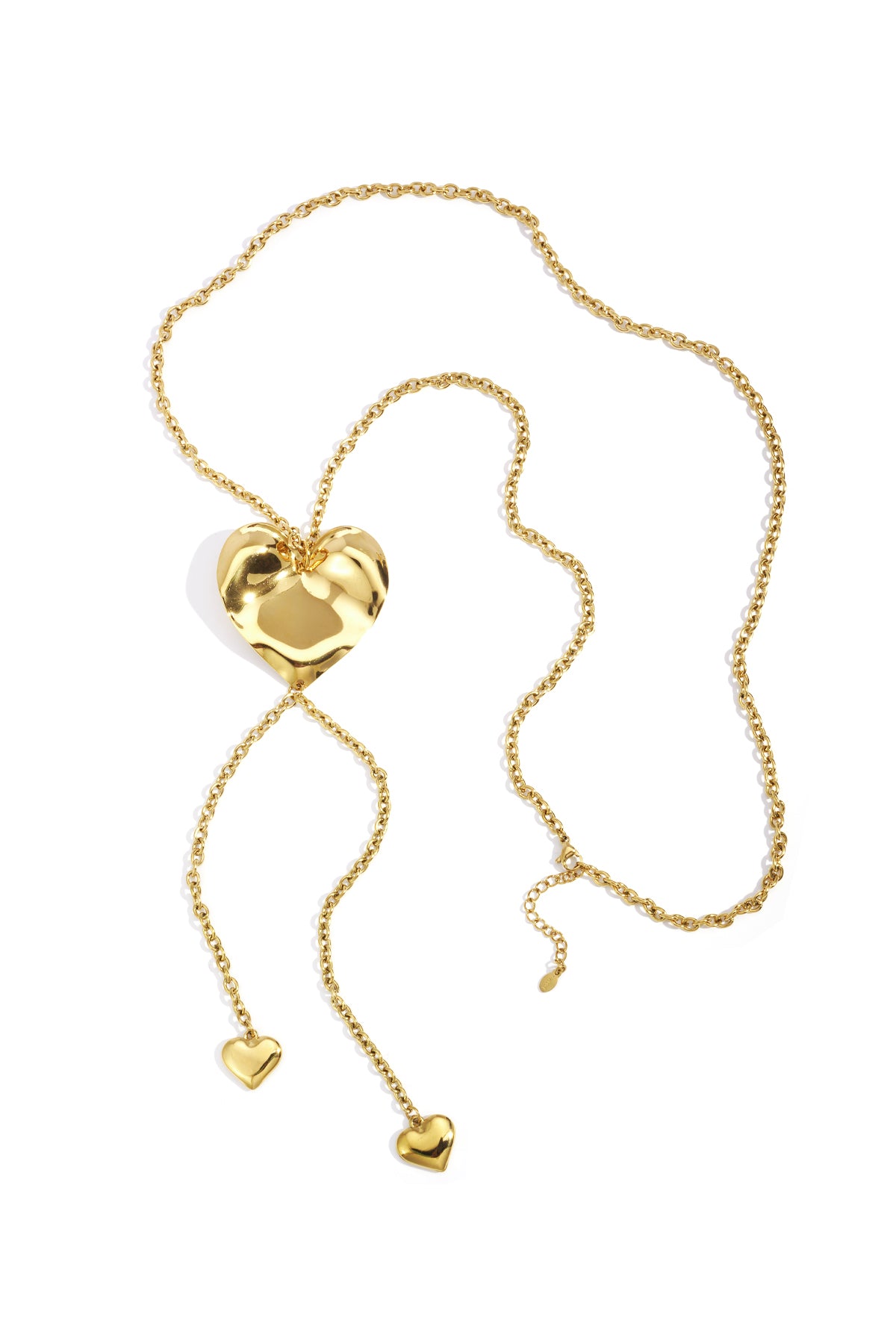 Gold-tone long necklace with a large shiny heart pendant and two smaller dangling hearts on a white background