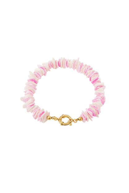 Pink and white shell beaded bracelet with gold toggle clasp on white background