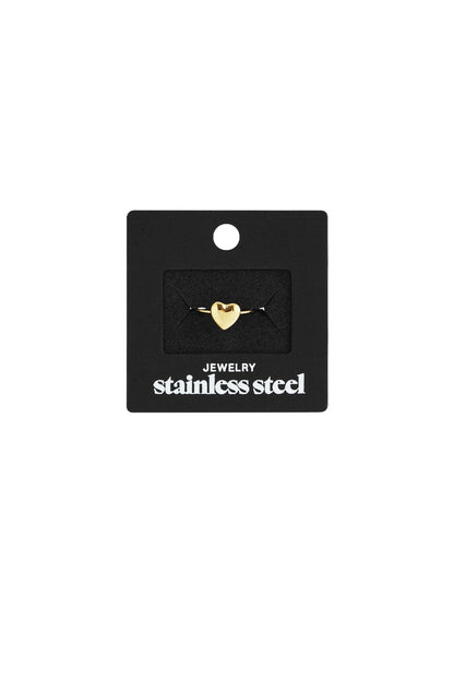 Little Heart Crush gold-tone stainless steel heart ring on a black display card.
