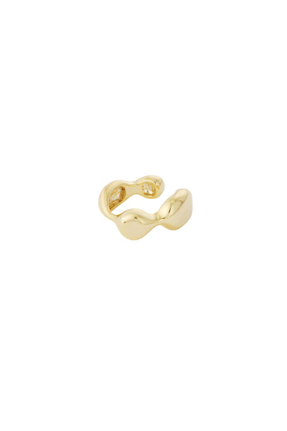 Close-up of shiny gold wavy ear cuff with smooth curvy design on white background