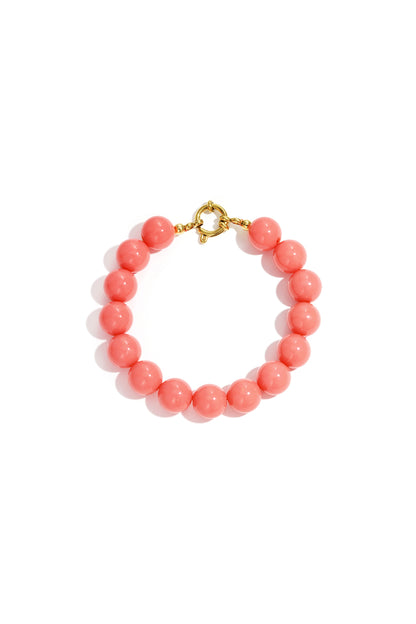 Light purple resin bead bracelet with gold toggle clasp on white background
