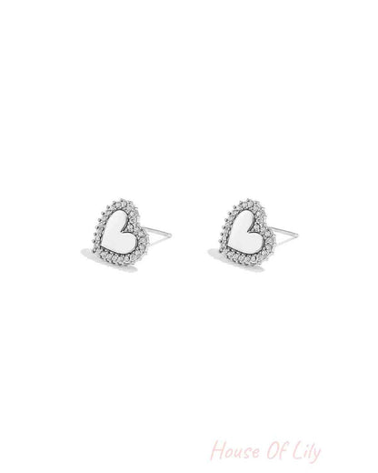 Heart-shaped stud earrings with set edges