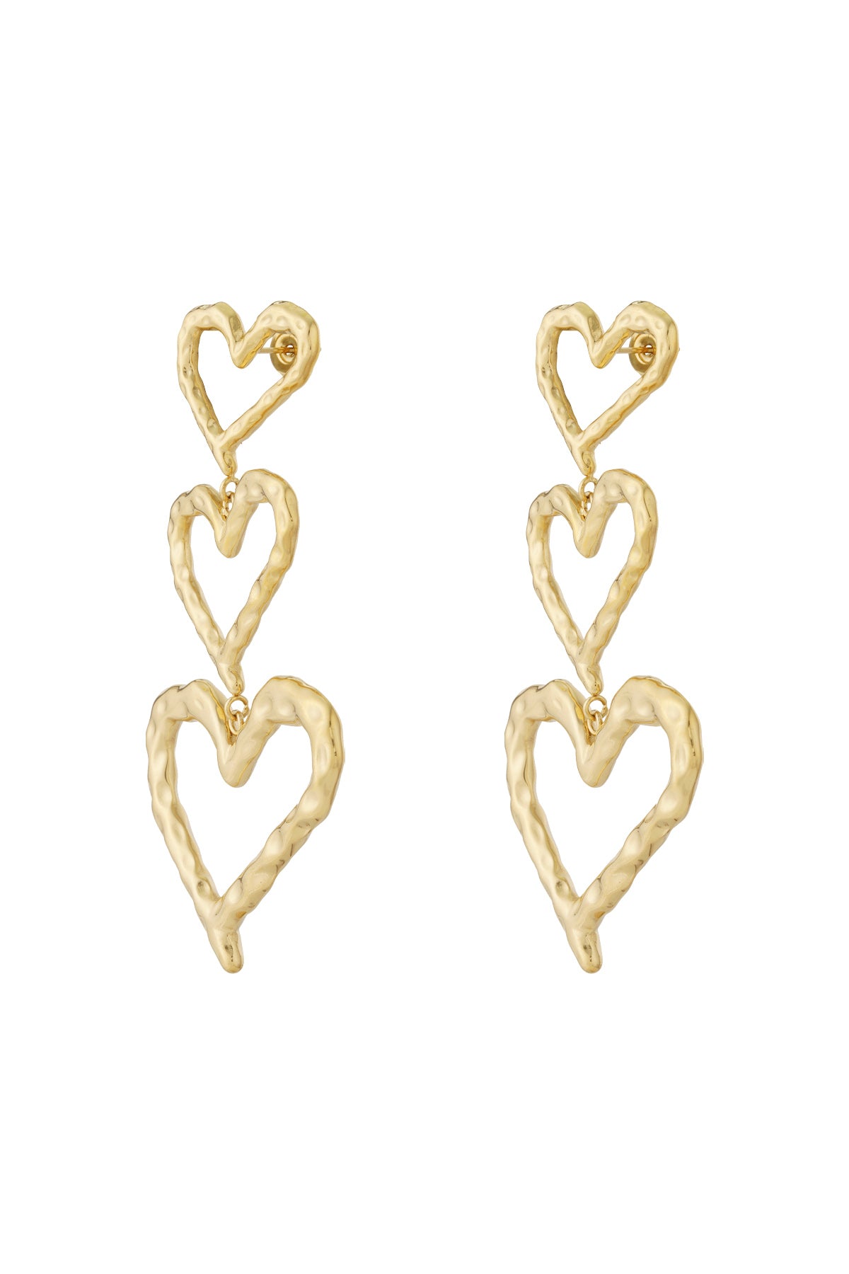 Pair of gold-tone triple heart dangle earrings with hammered textured metal on white background