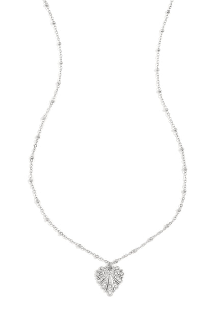 Silver crystal leaf pendant necklace with beaded chain on white background