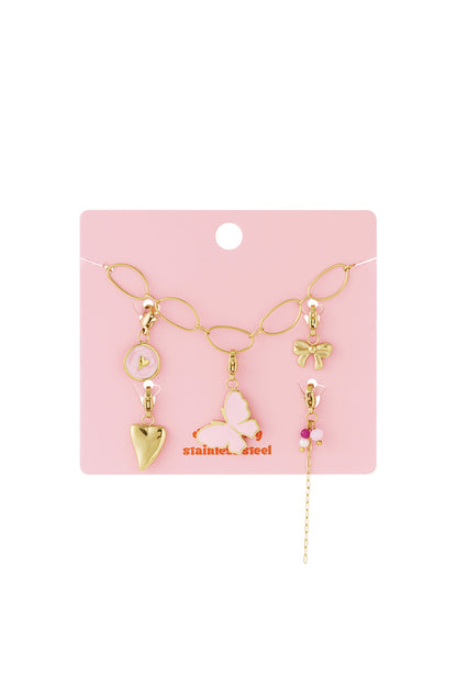 Gold-tone chain bracelet with charms including a pink enamel butterfly, gold heart, pink accents, and a bow.