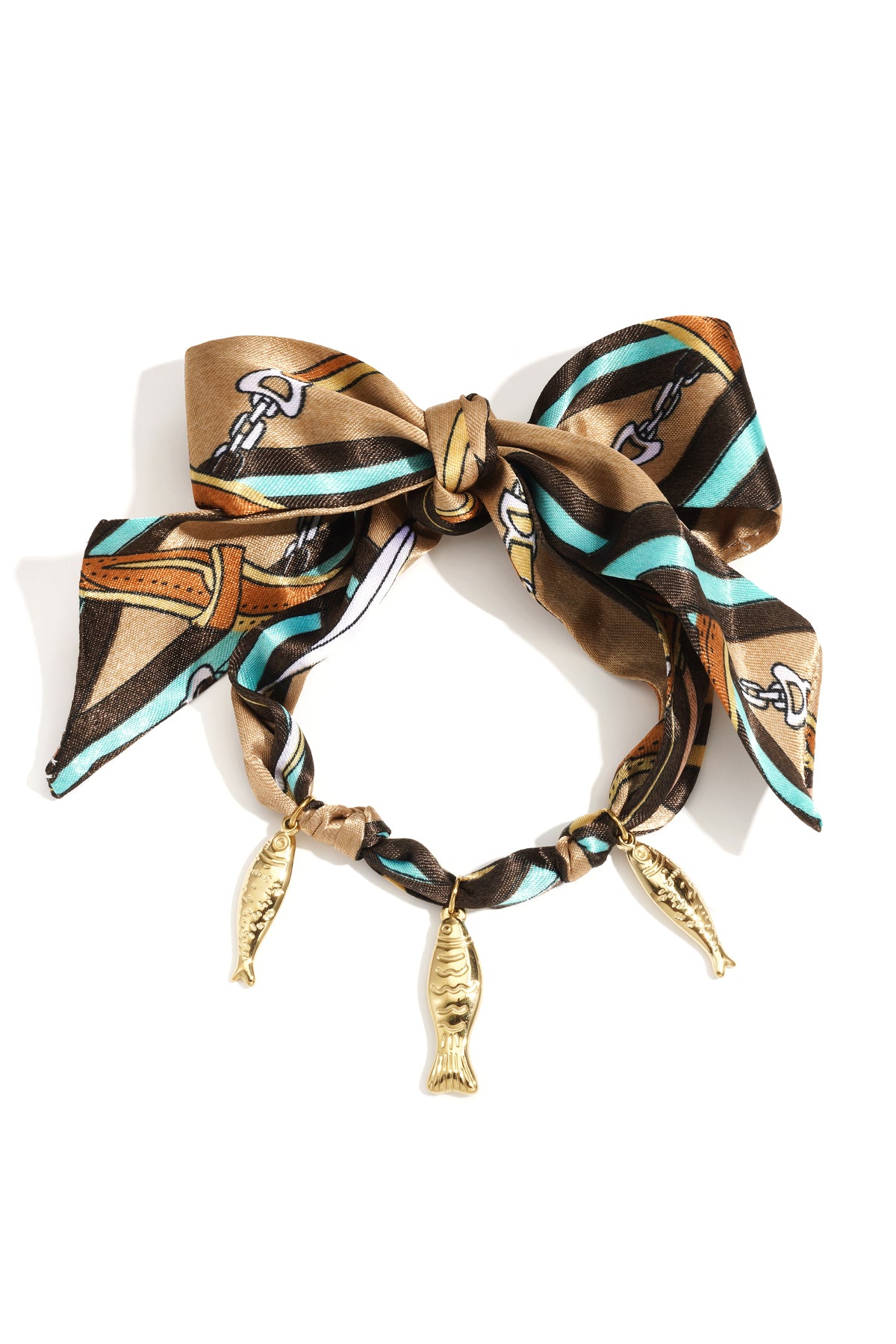 Brown and turquoise striped silk wrap bracelet with tied bow and hanging gold fish charms on white background