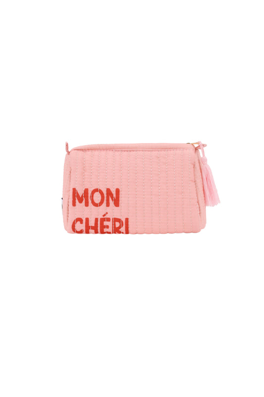 Pink quilted makeup bag with MON CHÉRI lettering and tassel zipper pull