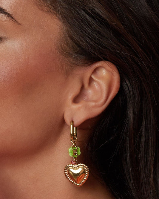 Earrings with colorful beads and detailed heart charm