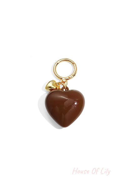 Glossy chocolate brown heart-shaped acrylic bag charm with gold alloy ring and tiny heart charm