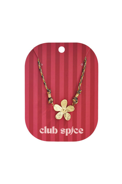 Bloom Baby Bloom necklace: a gold-toned flower pendant on a multi-colored cord with gold bead accents.