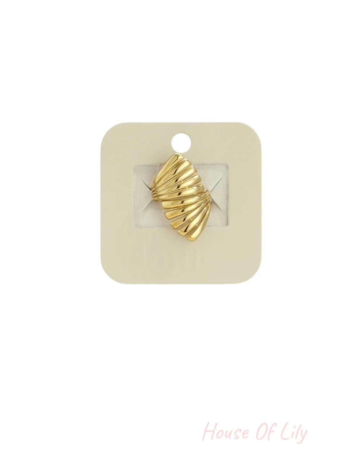 Gold metal ring shaped like a stylized fan or shell, displayed on a square card.