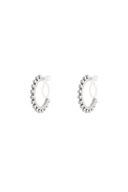 Pair of silver-tone beaded hoop clip-on earrings with clear silicone backings isolated on white background