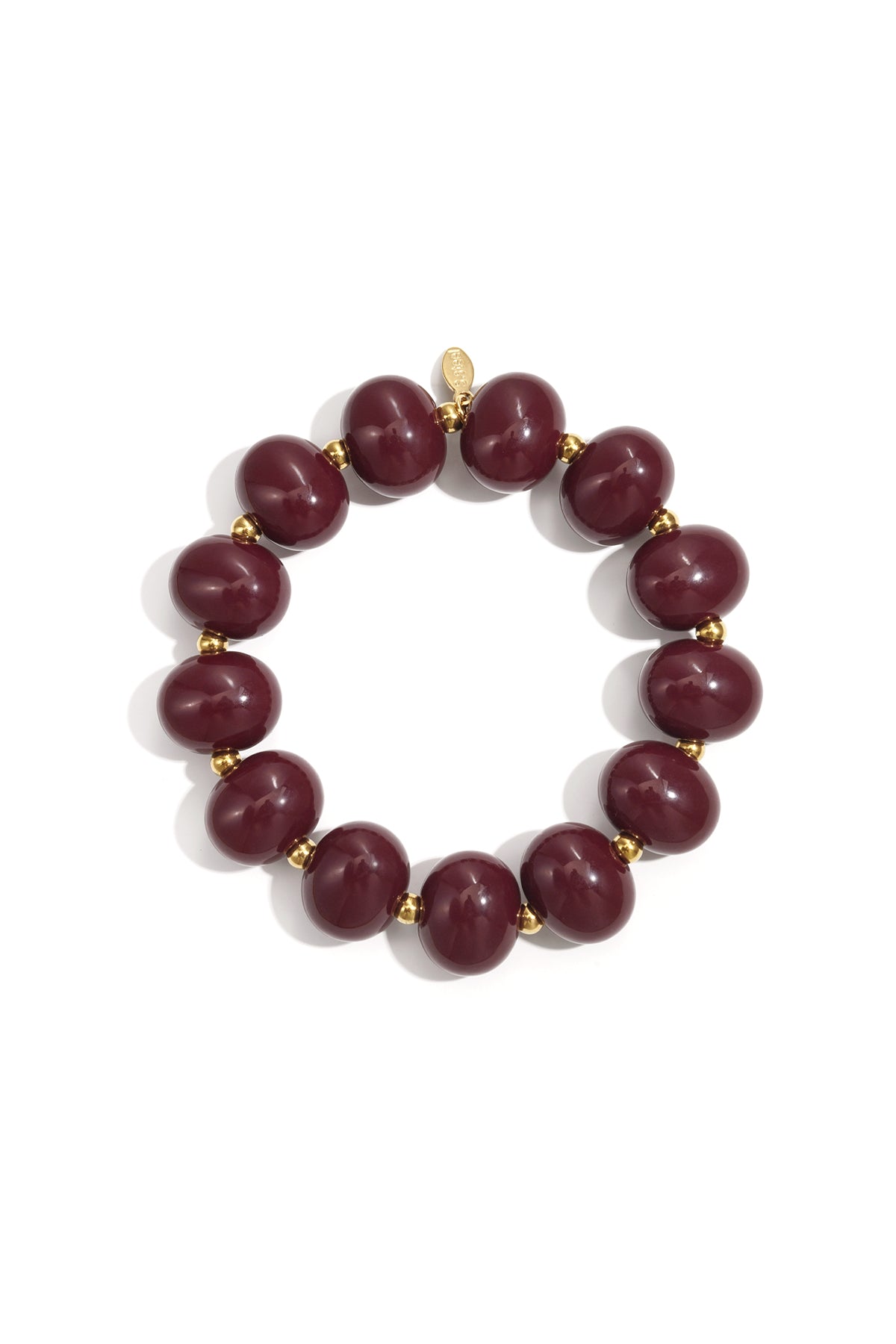 Burgundy marbled beaded stretch bracelet with gold spacer beads on white background