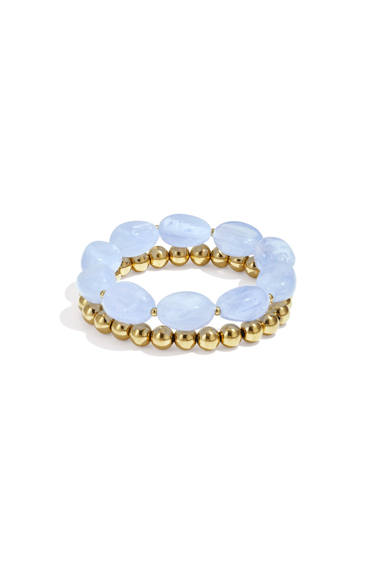 Close-up of two beaded stretch bracelets featuring oval lavender resin beads and gold-tone round beads on white background